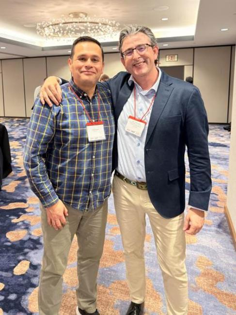 Camilo Jauregui (left) represented Waynesburg University at the AMS - SMT Annual Meeting as a member of the Latin American committee