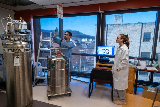 Dr. Suyama and Kate James utilizing the NMR equipment for research in Stewart Science Hall
