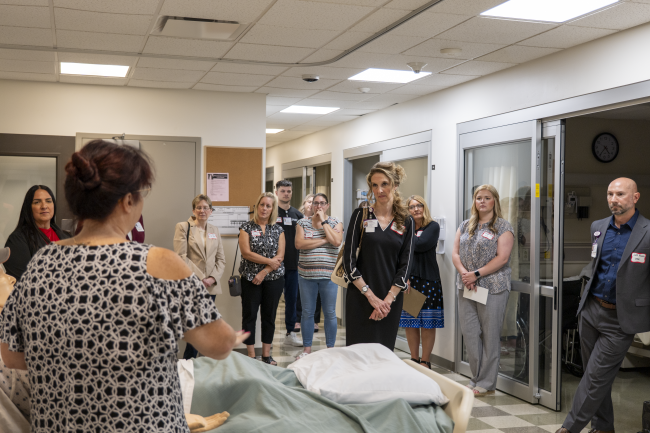 Local healthcare leaders, clinical partners, and representatives from community organizations touring the Clinical Learning Center on the first floor of Stewart Science Hall in the Department of Nursing at Waynesburg University