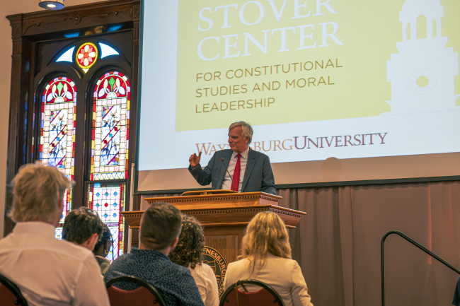 Peter Canellos pictured in Alumni Hall on Waynesburg University's campus, speaking to an audience of students including members of the Stover Center for Constitutional Leadership program